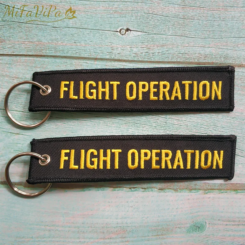

2 PCS/Lot Fashion Christmas Gift Keychain Trinkets Chaveiro Boeing Key Chains Yellow FLIGHT OPERATION Embroidery llavero for Men