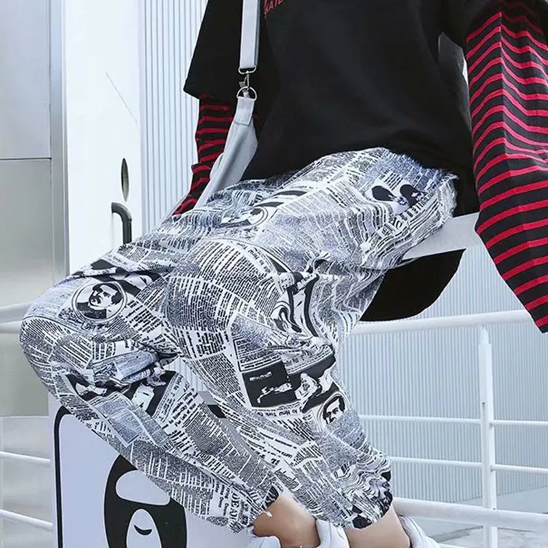 

Women Korean Style Pants Newspaper Print Drawstring Elastic Waist Couples Fashion Hip Hop Pants