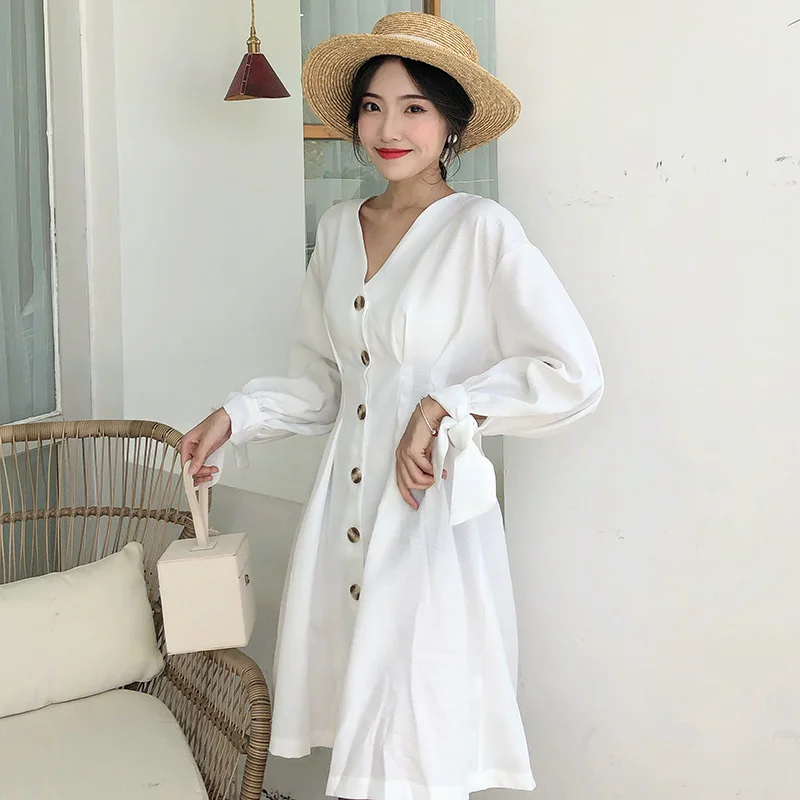 Женское мини платье с бантом белое элегантное вечернее v образным вырезом и