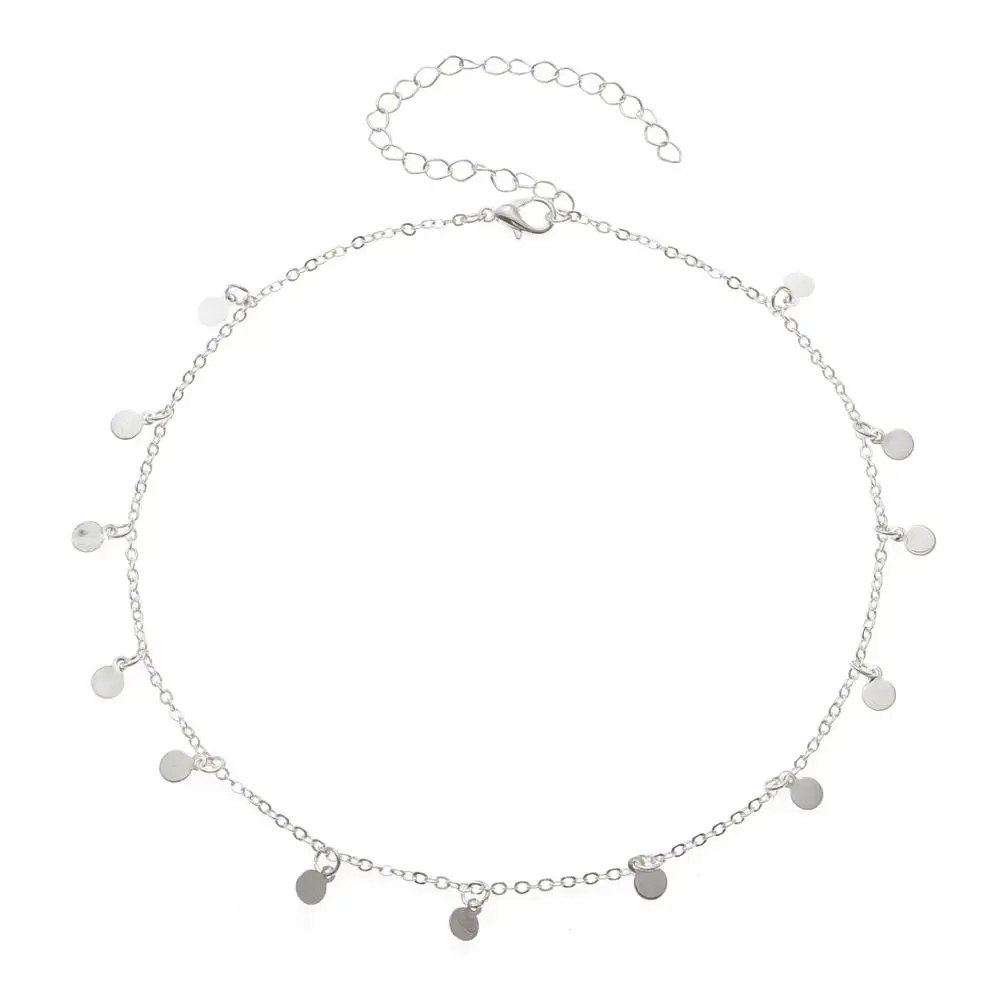 Женское колье чокер золотистого цвета с блестками монетами и кисточками