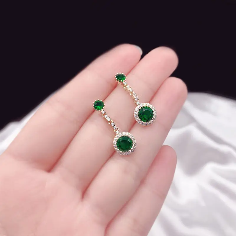 Дизайнерские оригинальные новые темпераментные серьги с изумрудно-зелеными