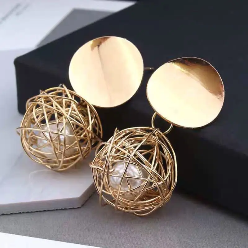 

2022 Hot Women's Fashion Statement Earrings Geometric Metal Hollow Ball Drop Earing For Women Jewelry Aretes De Mujer Modernos