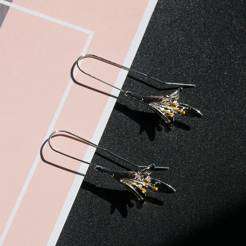 

SNCSDK European and American lily ear hooks retro flower Women dangle earrings fashion jewelry Women's earrings