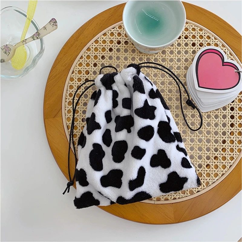 

Women Winter Fuzzy Fluffy Warm Hoodie Earflap Cap Cross Collar Scarf Drawstring Storage Bag Cute Cow Print Ear Warmer