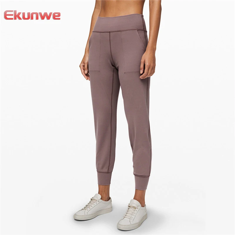 

Naked-feel Fabric Loose Fit Sport Active Lounge Jogger Butter Soft Elastic Leggings With Two Side Pockets Full length Yoga Pants