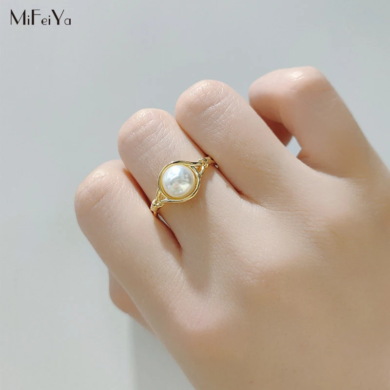 

MFY Fashion Ladies Ring Simple Cross Inlaid White Imitation Pearl Opening Adjustable Ring Factory Direct Sales
