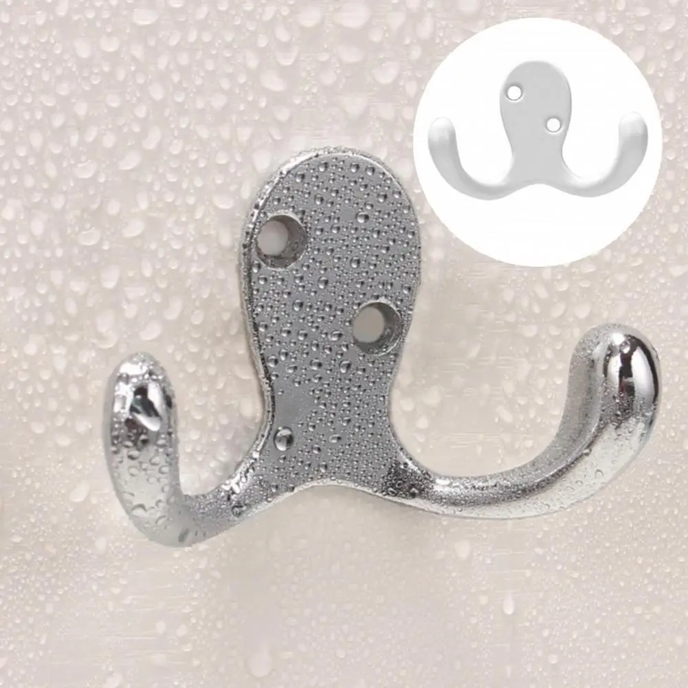 

Однотонная вешалка для полотенец с гладкими краями и тонкой отделкой