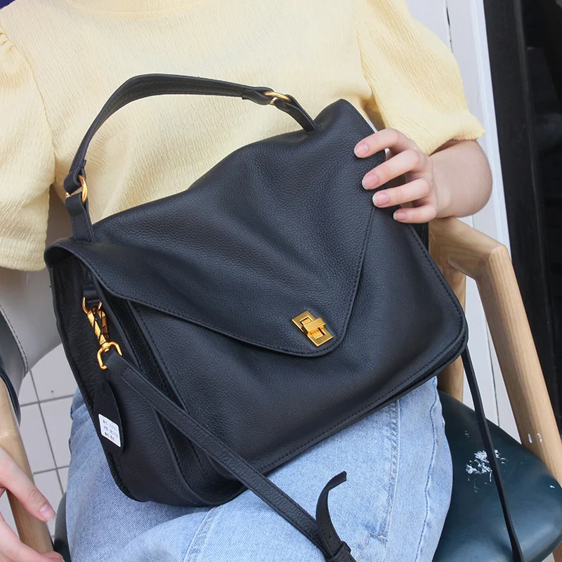 

Soft cow leather simple postman's bag