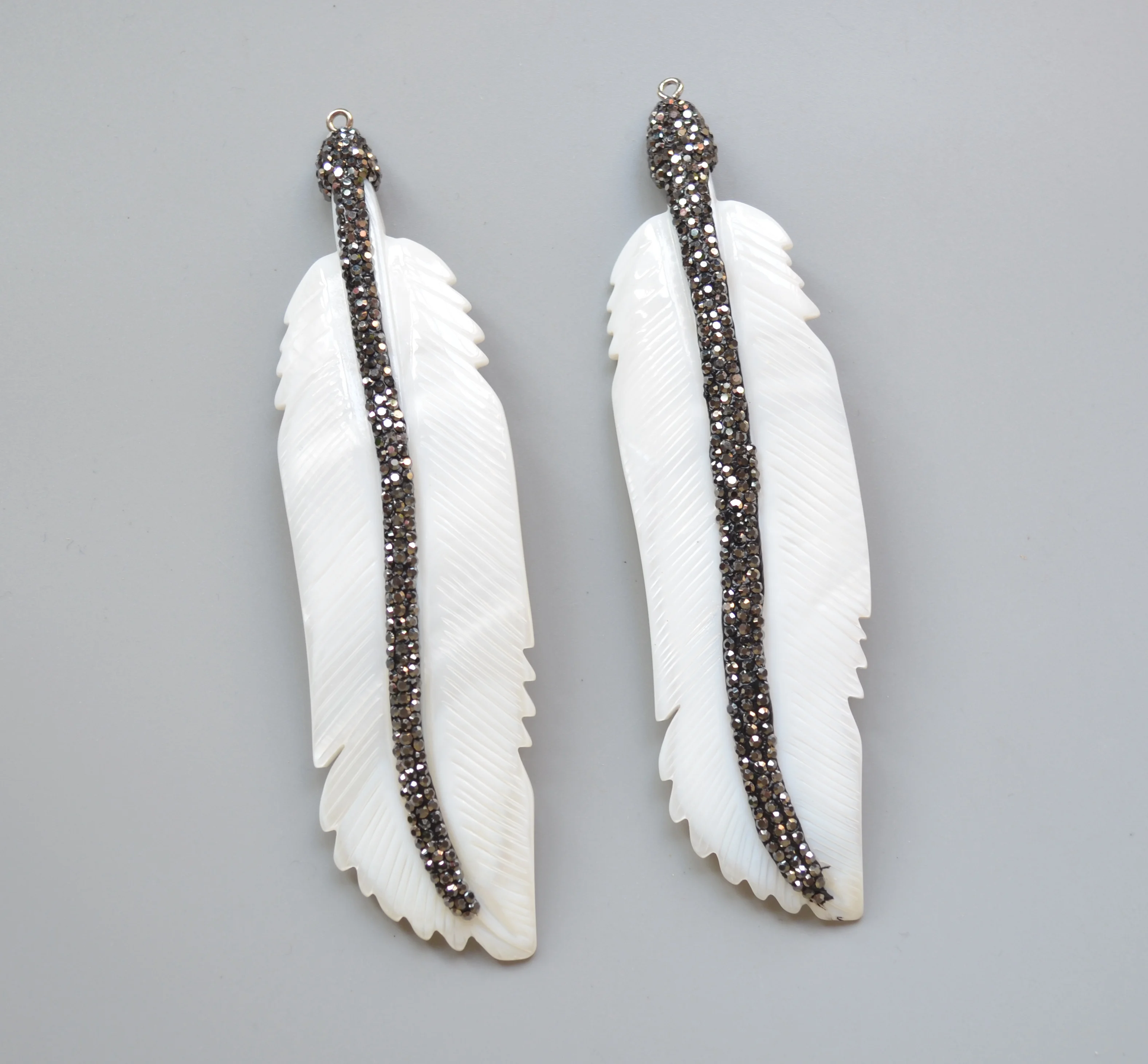 

White Feather shell pendant with crystal zircon paved---