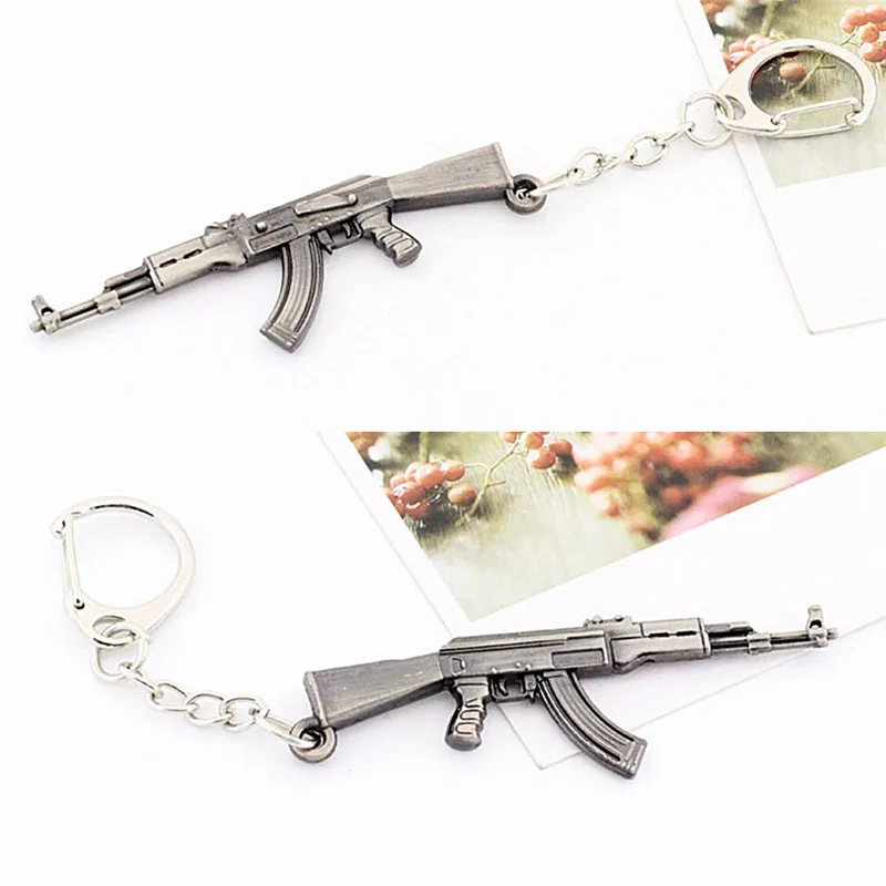 Ключница в форме оружия Novelty Weapon Gun Keychain CF AK47 Mode Pendant Key Chain Chaveiro Holders Ring For Men'S Gifts размером 6 см.