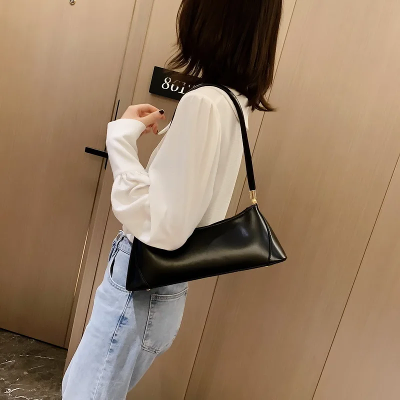 

Female Bag 2019 New Korean Fashion Wild Color Hand Bag Shoulder Bag PU Leather Rivet Solid Color High Quality And Large Capacity