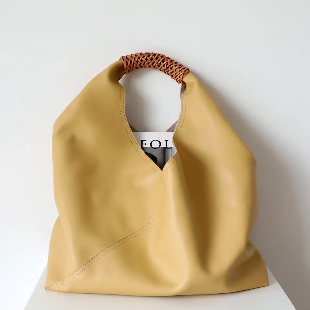 

Niche design cowhide women's bag fashion versatile simple splicing woven one shoulder women's bag geometric underarm Bag Tote