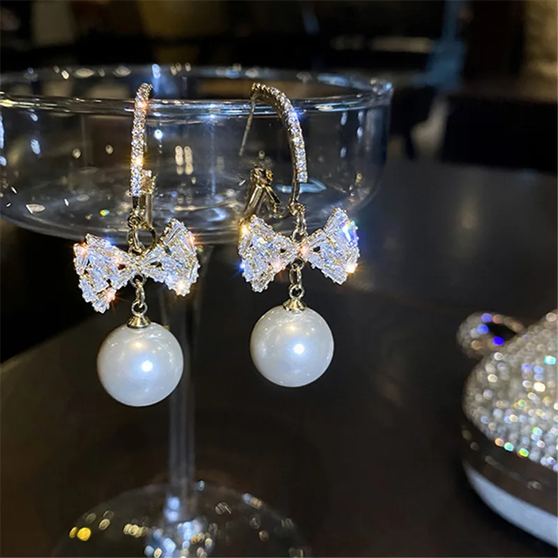 

2021 New Fresh Shining Rhinestone Crystal Bowknot Drop Earrings Elegant Temperament Pearl Women Earrings Jewelry