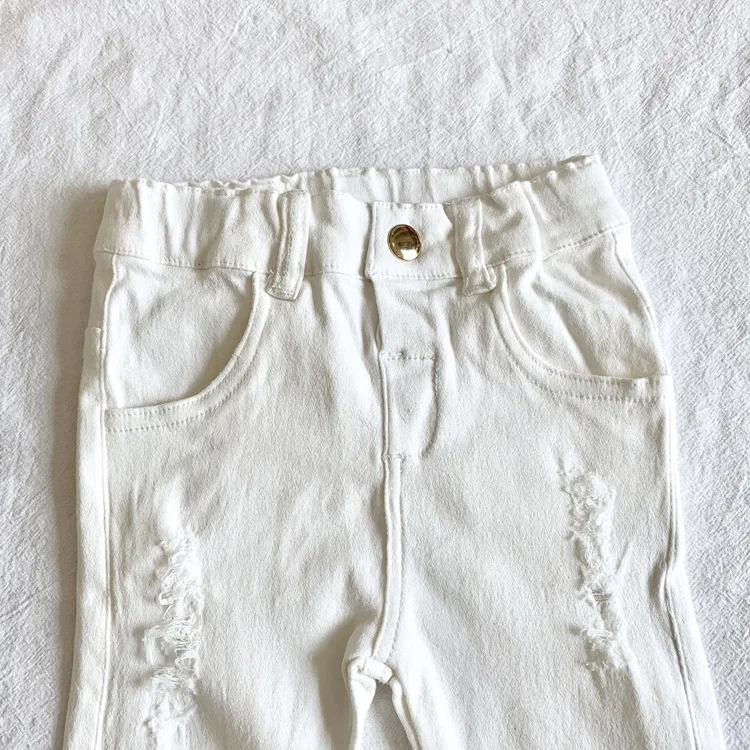 Демисезонные рваные джинсы для маленьких девочек детские брюки с дырками белые