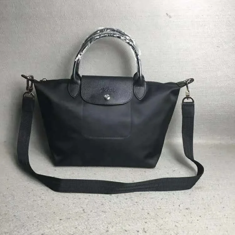 

Short handle portable messenger thickened 1515 medium dumpling bag female 1512 small longxiang bag waterproof nylon travel bag