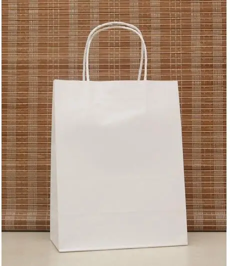 

30PCS/lot white color paper gift bag Festival Paper bag with handles Fashionable cloth bags Excellent Quality 27*21*11cm
