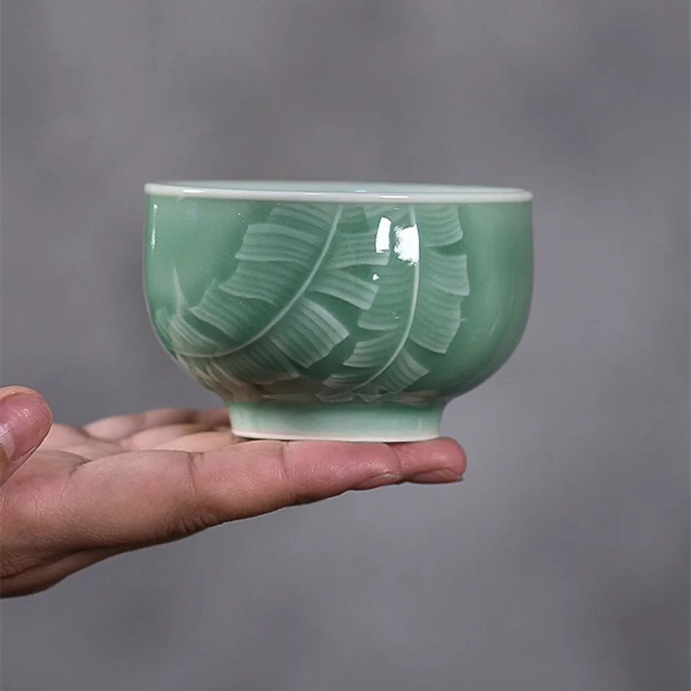 

Chinese Kung Fu Teacup 1PC Flat Cup 4oz Ceramic Cups of Tea 130ml Handmade Celadons Porcelain Drinkware Decor Banana Leaf