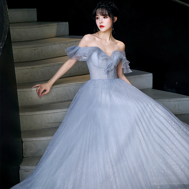 

Женское длинное платье с открытыми плечами, оборками и открытой спиной