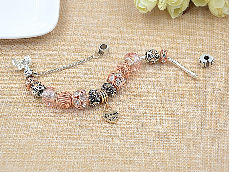 Женский браслет с бусинами и кристаллами золотистого цвета|Браслеты шармами| |