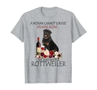 a woman cannot survive on wine alone rottweiler gift funny t shirt