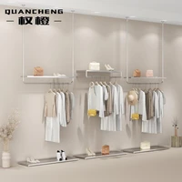 wall mounted stainless steel titanium silver womens clothing store clothes display shelf on the clothing store display shelf