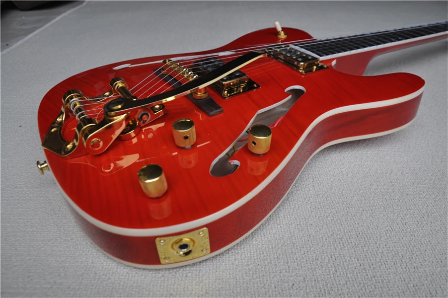 

free shipping custom 6 string orange semi hollow guitar,tremolo bridge,golden pickups,gold swtich,f hollow ,white binding