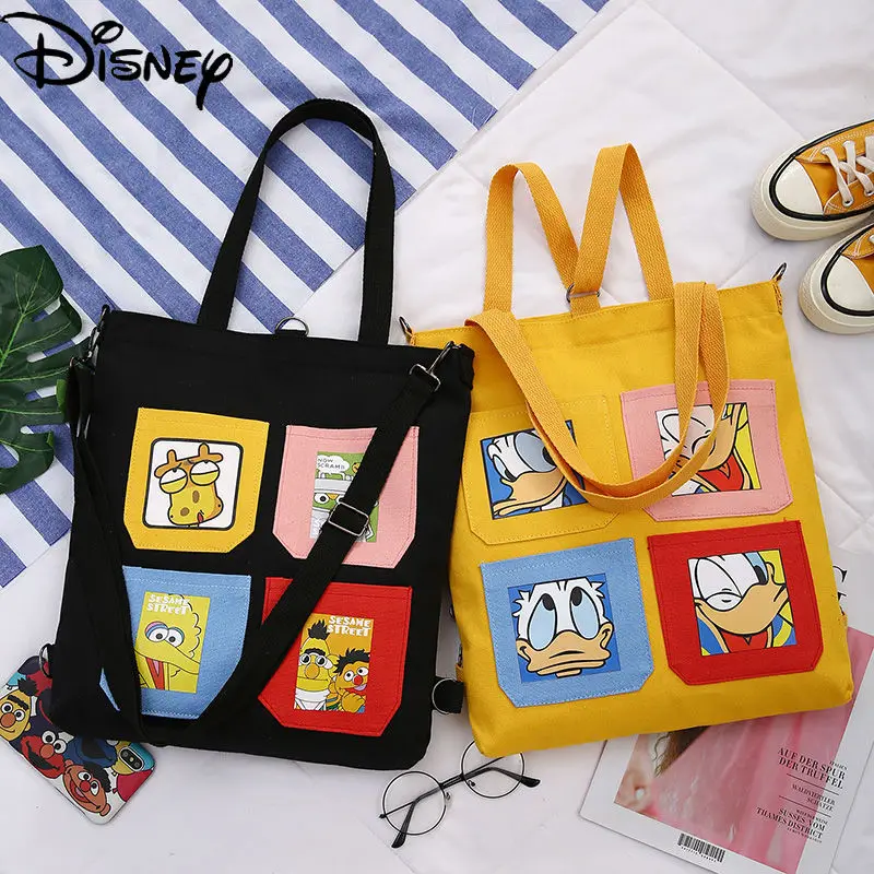 

Disney Diagonal All-match New 2021 Printed Canvas Bag Simple Cartoon Animation Large-capacity Shoulder Bag Student School Bag