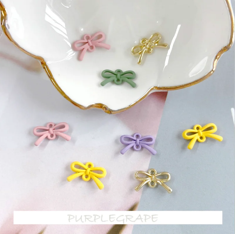 

Cute Girly Heart Wild Alloy Painting Double Hanging Bow Connection Creative DIY Handmade Earrings Earrings Material