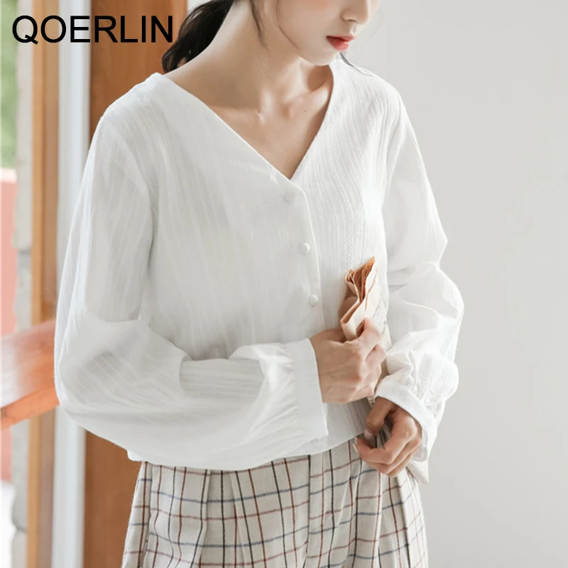 

Женская блузка с V-образным вырезом и длинным рукавом