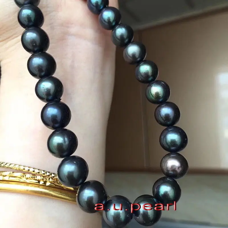 

AAAAA 18 inch 10-11mm Natural REAL ROUND TAHITIAN black pearl necklace