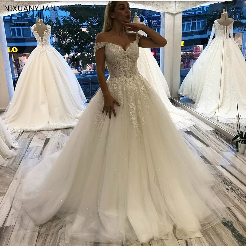 

Robe De Mariee Charming Wedding Dress Ball Gown Off Shoulder Bride Dress Lace Up Appliques Tulle Sequin Dubai Vestios De Novia