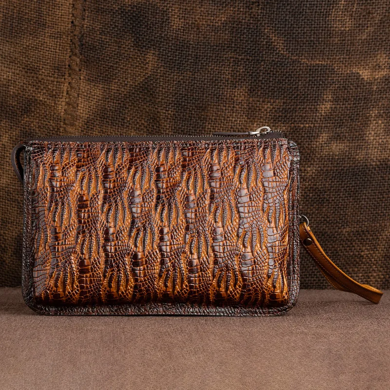 

New men's top layer cowhide retro embossed European and American hand held document bag hand held envelope zipper bag