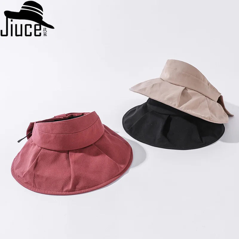 

south Korean web celebrity pure color empty hat fold bowknot is no big along the cap han edition joker leisure sun hat
