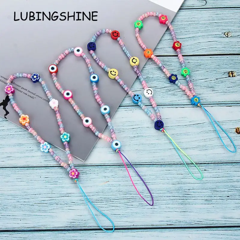 

Ethnic Style Soft Pottery Hand-phone Straps Flower Smiley Mobile Phone Chain Wholesale Sead Beads Beaded Wrist Jewelry for Girl