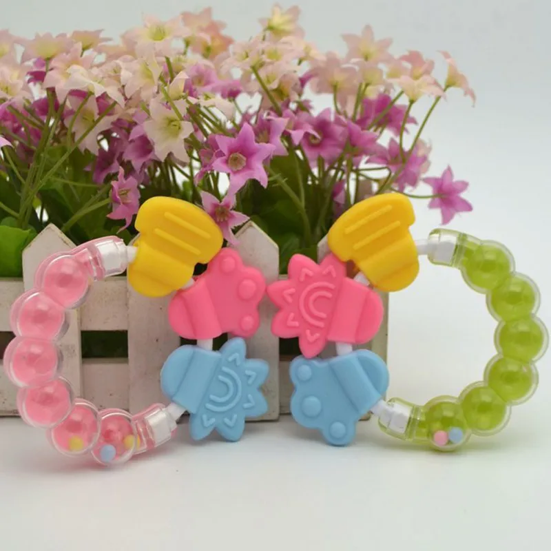 Детская игрушка для прорезывающихся зубов с героями мультфильмов зубы кусаются