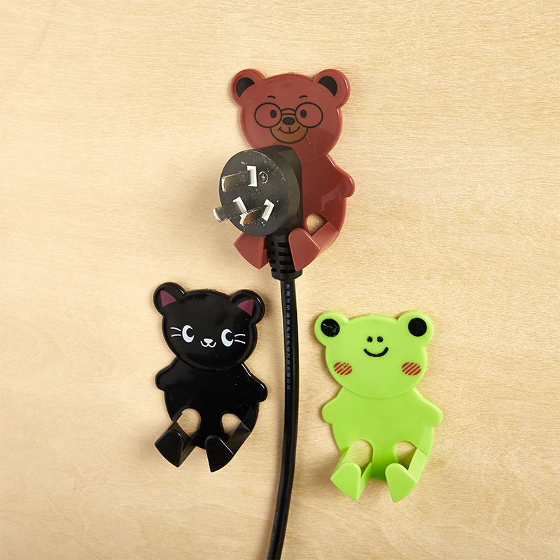

4pcs/lot Cartoon animal sticky power plug hook Household socket storage plug line card