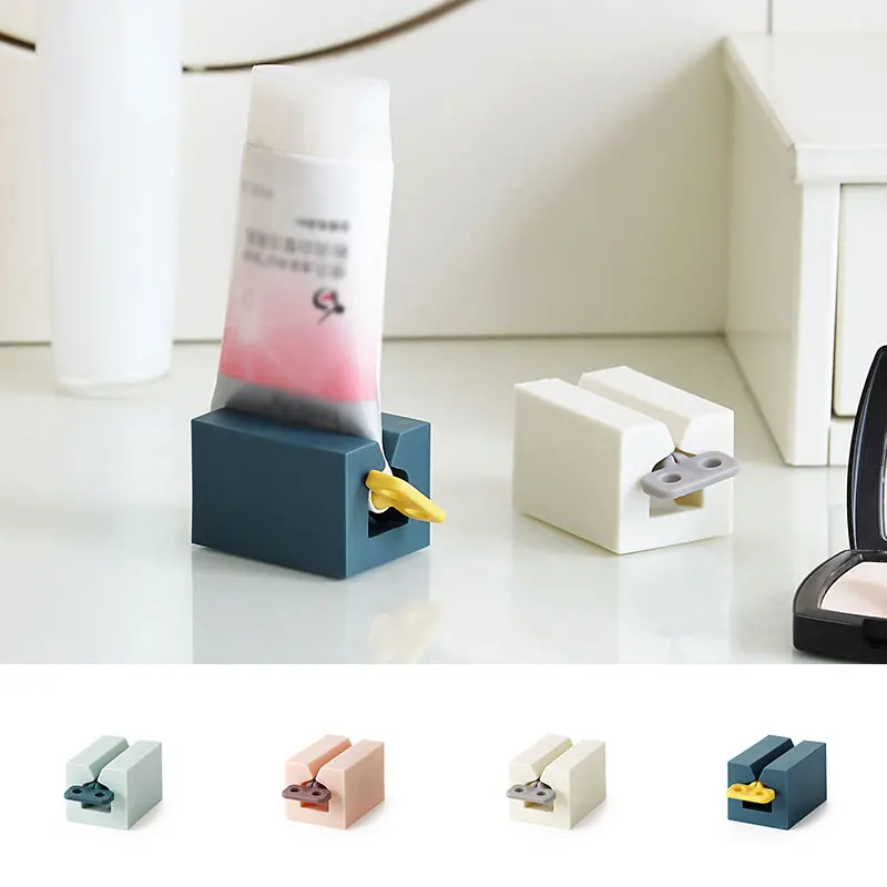 

Multifunctional Bathroom Plastic Cream Tube Squeezing Dispenser Rolling Tube Squeezer Tooth Paste Squeezer Toothpaste Dispenser