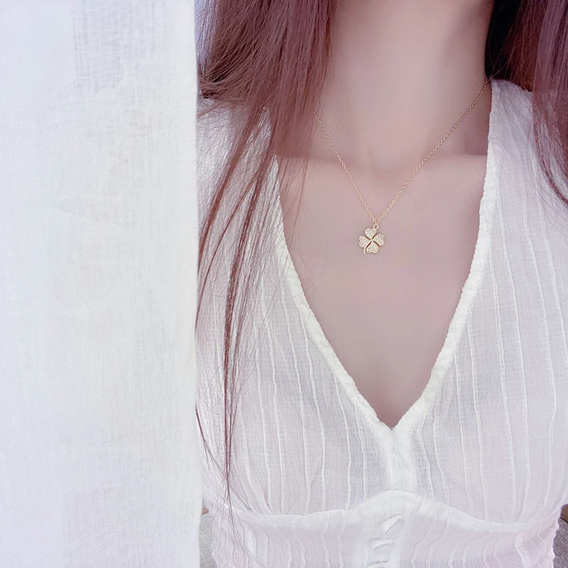 

Korean version of exquisite micro-set zircon flashing four-leaf clover lucky girl temperament short necklace chain clavicle chai