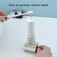 rolling squeezer toothpate dispenser tube sucker holder dental cream bathroom accessories manual dispenser gadgets squeezer
