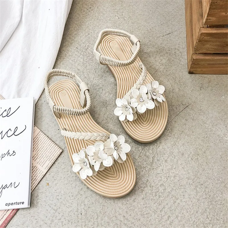 

2020 China summer sandals women's open toed flower women's shoes flat bottomed with Roman beach sandals women