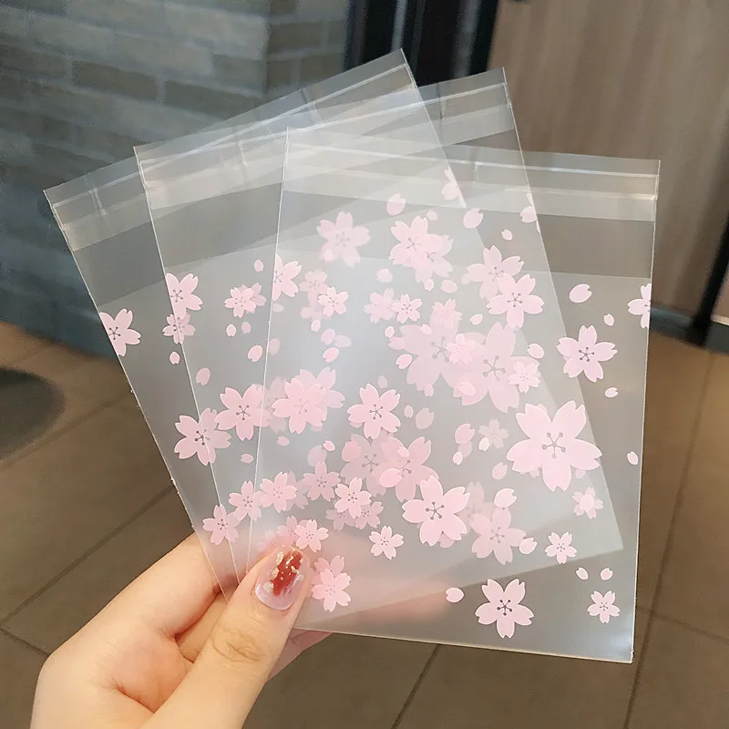 

New 100pcs Cartoon Cherry Blossom Frosted Packaging Bag Ziplock Bag Jewelry Earring Necklace Ring Packaging Bag Candy Sealed Bag