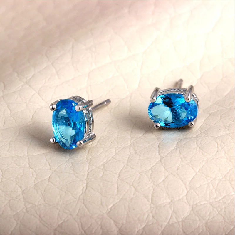 Очаровательные блестящие синие овальные серьги гвоздики с кристаллами