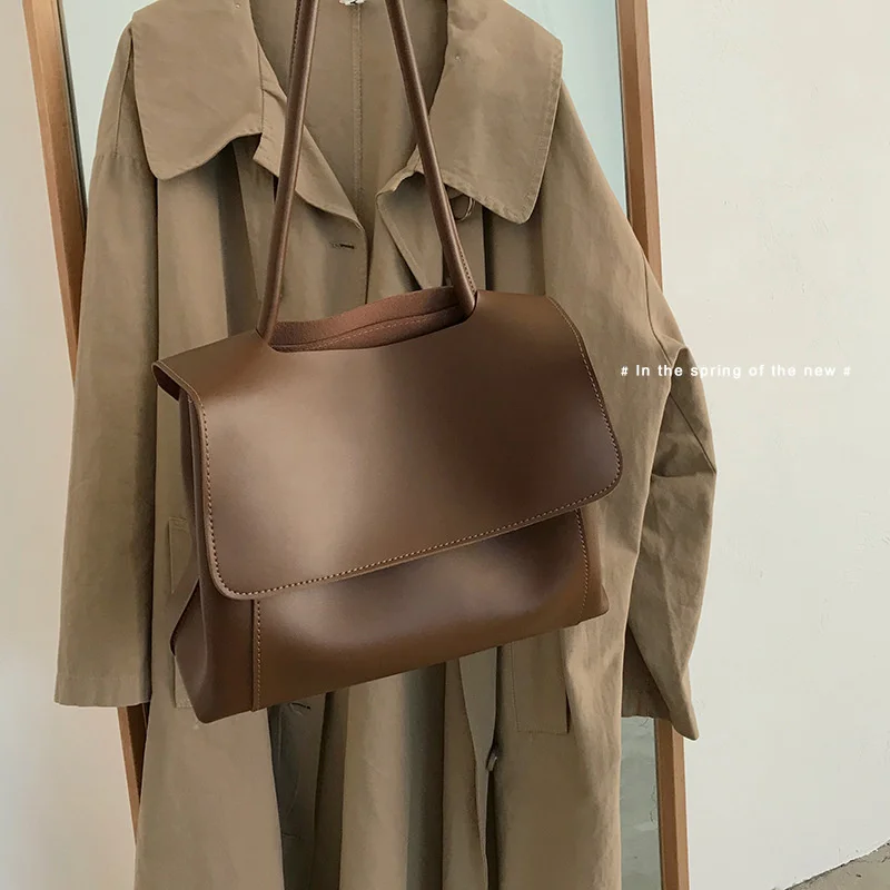 

Женская сумка, вместительная сумка, новый модный сетчатый красный портфель, нишевая дизайнерская сумка с простой текстурой, сумка на одно п...