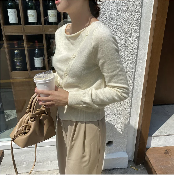 

Simple Round Neck Single-Breasted Solid Color Knitted Shirt Female 2021 Spring Irregular Long Sleeve Knit Jumper Top for Women