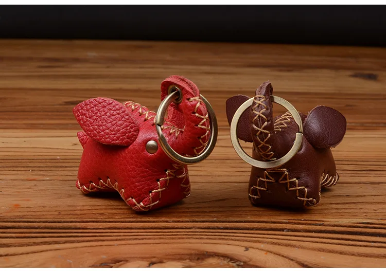 

Оригинальные брелки для ключей из коровьей кожи с изображением слона, ручная работа, милый мультяшный трехмерный брелок с изображением сло...