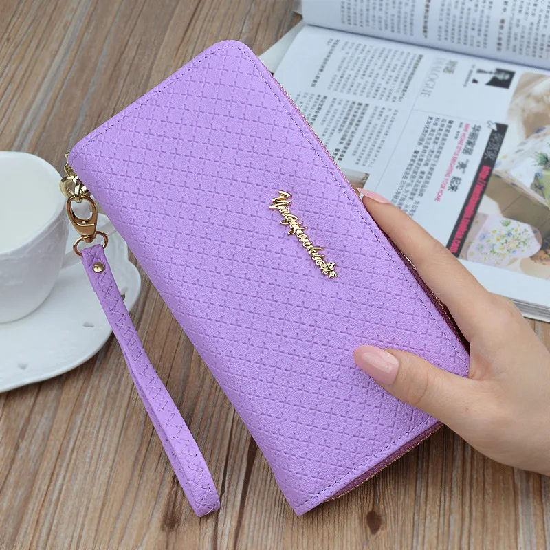 

The New Clutch Purse Ladies Wallet Long Zipper Fashion Embossed Soft Wallet PU Leather Wallet Women Mobile Phone Bag.