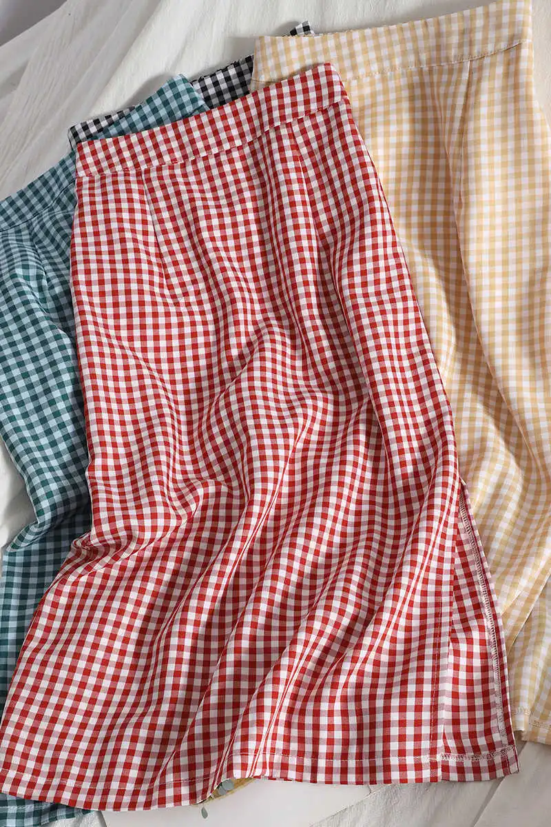 

Age reducing color contrast plaid skirt spring and summer new side split one step skirt show thin buttock skirt high waist over