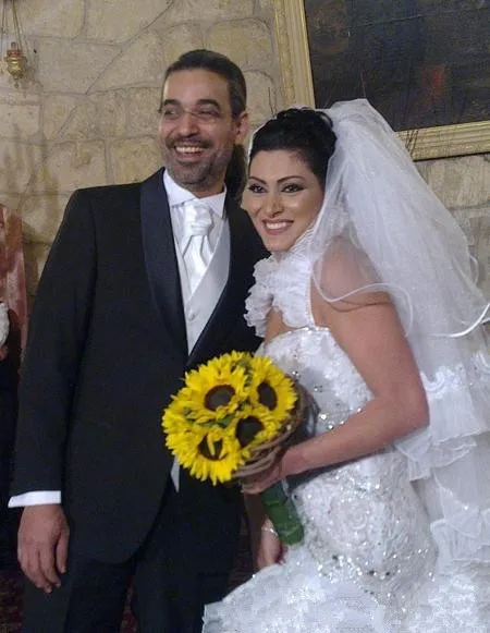 

Arabic Female Stars Wedding Dresses Tiered Skirts Crystal Beaded Muslim wedding Gowns Bridal Dresses Open Back Cascading Ruffles