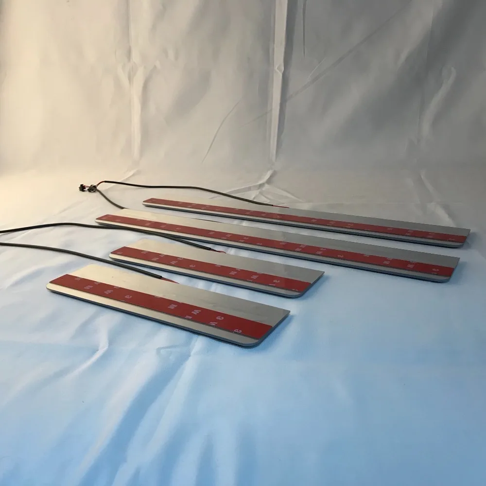 

Infrared sensor control led door sill plate strip welcome light threshold guard protectors for Mitsubishi Lancer ex