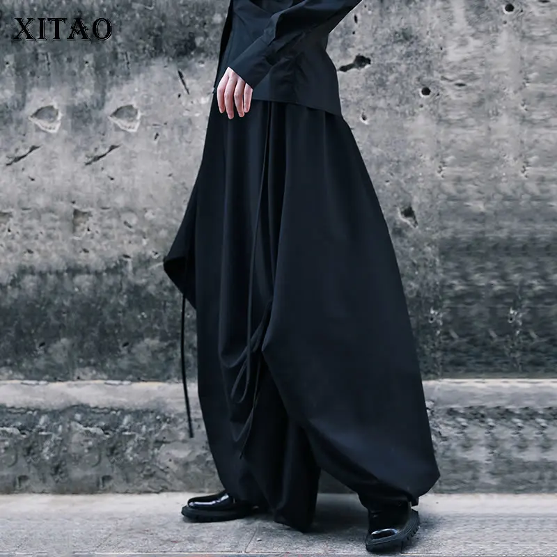 

XITAO юбка на шнурке, модная новинка, Женская плиссированная юбка с эластичной резинкой на талии, необычная черная, 2021, осенняя Свободная юбка, ...